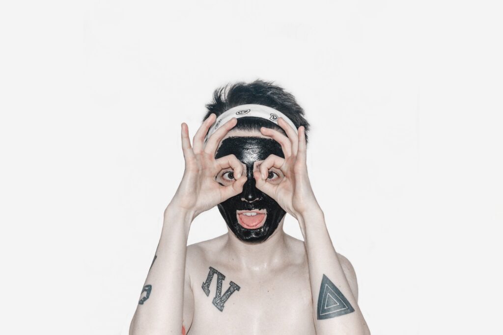 Teenage boy with a mask on his face